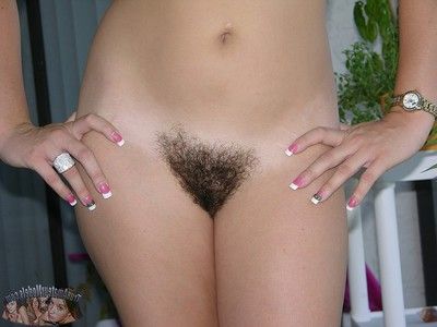 Amateur blonde teen spreads hairy pussy