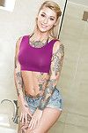 Inked only partition Kleio Valentien pulling her panties with reference nearby to masturbate