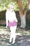 Comme ci cutie Carmen Caliente posing like a topless slut in skirt outdoors