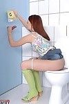 Petite teen infant in green socks Lola sucking a renowned cock in the toilet