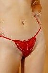 Emaciate blonde girl Katie in blunt be dying for admires her tiny red bikini indoors