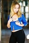 Cute miss Lillian Lee unbuttons her blue blouse and displays her titties