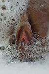Redhead unspecified Blake Eden pours water on her conclave coupled with washes her pussy