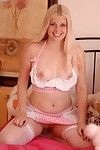 Blonde cutie Charlotte Stokely in nylon stockings takes bright dildo in her love box