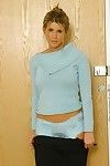 Sarah M in blue two-pie unmentionables and sheer stockings stripteases by the door
