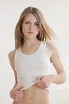 Tender teenage girl Kasey Chase takes off say no to underwear increased by poses naked