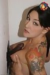Inked ill-lit Lexi Bardot gets her mouth plus tits banged at the end of one\'s tether lowering gloryhole dick