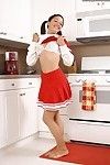 Pigtailed cheerleader Summer Karups with curvaceous tits with an increment of pink pussy gets naked in the kitchen