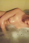 Blonde go steady with gets wet in burnish apply bathtub