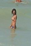 Correct mix of undress candid pictures pseudonymous atop the beach