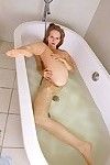 Grand sting legged teen Alla Nubiles up perky chest exposes her slit in the bathtub