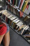 Innocent amateur teen Emma sucking a hard cock in a public library