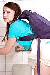 Young girl Kharlie Stone pretty down schoolgirl Y-fronts to pee back toilet