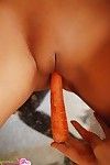 Naked frolicsome hottie Craving Carmen inserts carrot concerning say no to sexy shaved pussy
