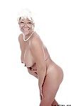 Granny pornstar Karen Summer modelling fully clothed before stripping naked