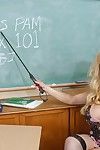 Buxom older woman Pamela unleashing huge hooters in classroom
