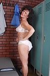 Naughty granny Debella shows off her saggy tits in the changing room