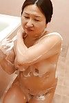 Chubby asian granny with saggy tits Miyoko Nagase taking bath