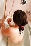 Chubby asian granny with saggy tits Miyoko Nagase taking bath