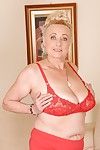 Lecherous granny with massive flabby jugs stripping off her clothes