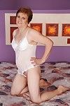 Naughty granny with hairy twat taking off her lingerie and spreading her legs
