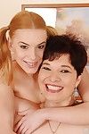 Fuckable granny and her graceful teen girlfriend posing naked together
