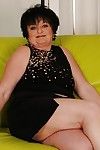 Chubby granny on high heels Leslie Pearl stripping off her dress