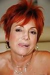 Redhead granny in nylon stockings gets shagged by a younger guy