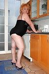 Fatty granny on high heels spreading her ass to show her tight holes