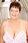 Fatty short haired granny on high heels stripping off her lingerie