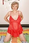 Naughty granny with big flabby boobs taking off her lingerie