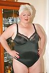 Short haired fatty granny with flabby boobs stripping off her clothes
