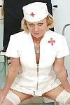 Curvaceous granny in nurse uniform masturbating her gloryhole