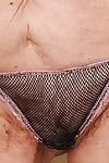 Very old granny doesn\'t mind to boast of her tits and pussy in panties