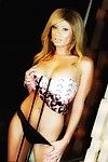 Beautiful milf Lisa Daniels in stylish dress and black panties displays her perfect big boobs