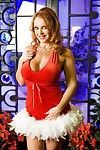 Hot and kinky posing from the bosomy milf in Christmas outfit Janet Mason