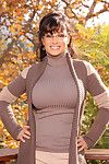 Brunette mom in glasses Lisa Ann gets nude outdoors to show her huge jugs and hairy snatch