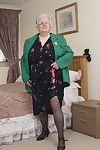 British granny playing with her voluptous body