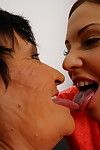 Horny mature lesbian licking a hot young babe