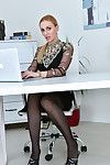 Leggy blonde Afina Kisser shows her secretary style