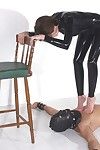 Latex catsuit mistress milf lady sonia trampling her slave