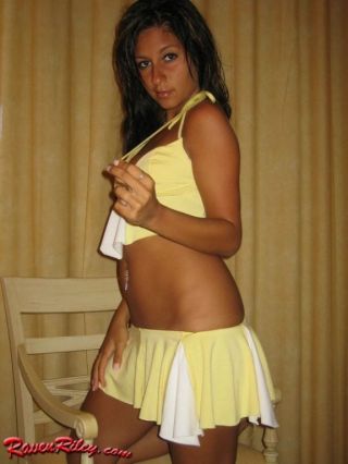 Raven adjacent to her sexy yellow skirt
